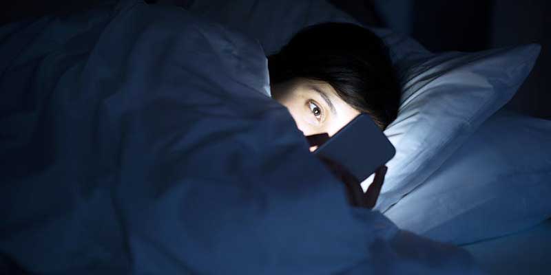Phone in Bed